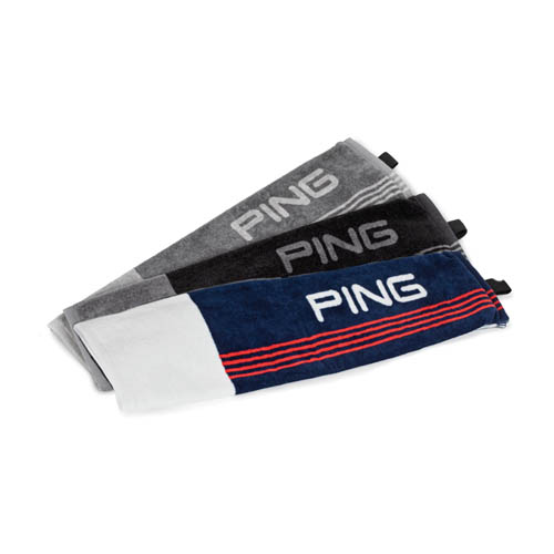 Image of the Tri-fold towels laying together- navy/red/white, black/grey, and grey